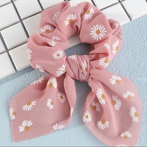 Light orange hair tie/scrunchie with white flowers